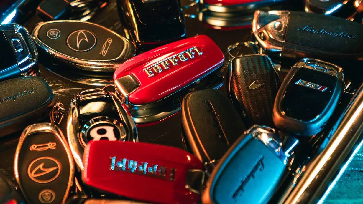 membership program exotic car keys closeup mph club