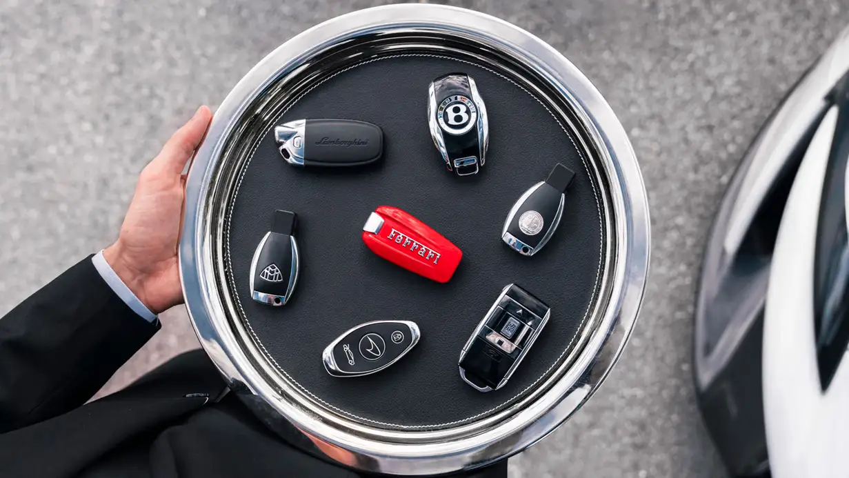 membership program exotic car keys tray mph club