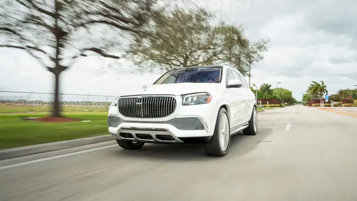 White Mercedes Maybach SUV rental rolling view mph club