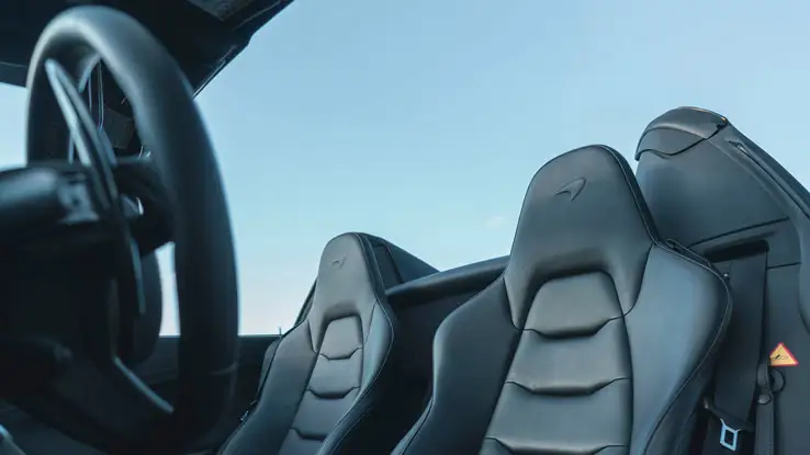 Yellow McLaren 650s Spider rental interior view mph club