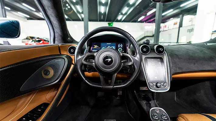 McLaren 570s Spider rental Miami dashboard view mph club