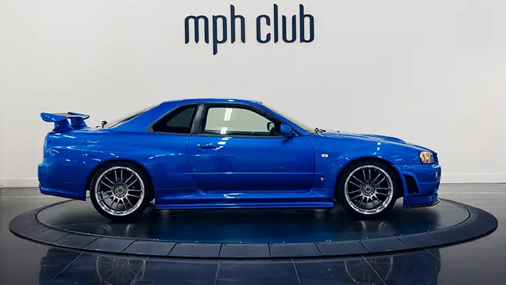 Nissan Skyline R34 rental side view - mph club