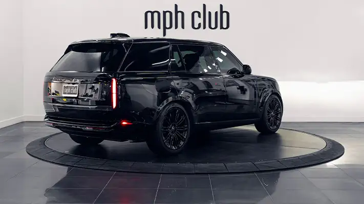 Black on black Range Rover rental rear view - mph club